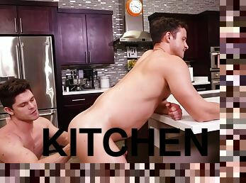 Stud deepthroat and fists down on the kitchen surface