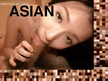 Asian girl lies down on her back to get satisfied