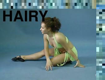 Mila Gimnasterka is a hairy tight beauty doing gymnastics