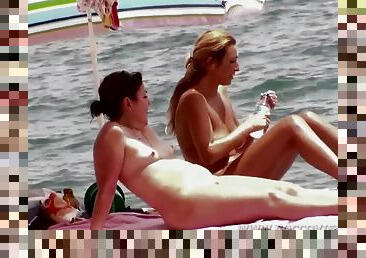 Naked MILFs on the beach - voyeur video