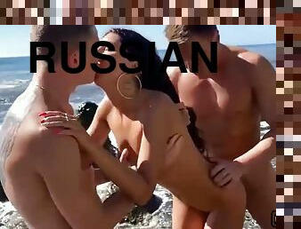 Russian skinny hooker gets gangbanged on the beach
