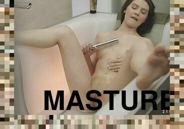 Delightful Timea Bella washing her wet naked body in bathroom