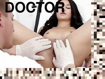 The doctor checks her vagina