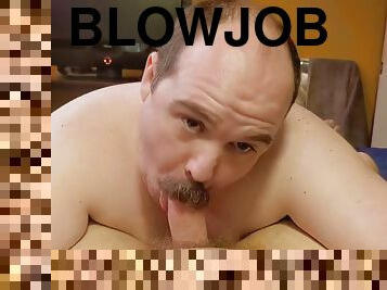 Handsome daddy with a mustache gives a hot blowjob to Bubba Bears chubby cock and gets a big load of cum in return