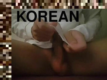 Korean boy masturbates in gauze uncut cock