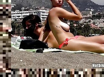 Shameless teens caught topless on the beach
