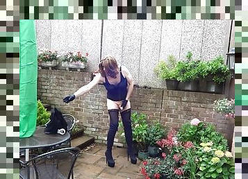 And wank in the garden in the thigh-high boots plugged