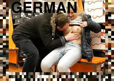 German blonde in black down jacket masturbating and squirting in jeans