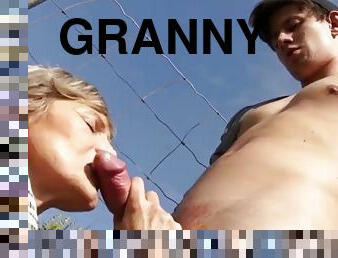 Horny granny banged hard outside by young jock cock