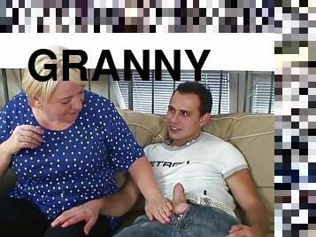 Blonde granny with big boobs rides his dick