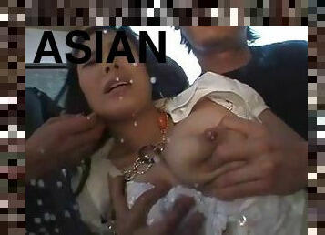 Asian woman milked by group of guys