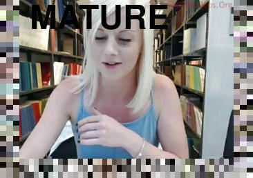 Blonde mature star Shelly flashing in public library