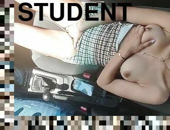 beautiful student fingers her delicious pussy in the uber.