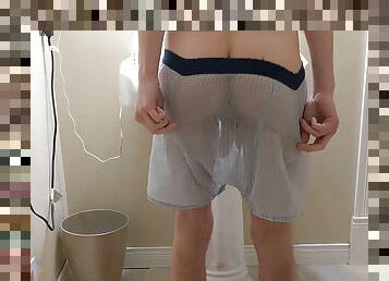 Stripping from threadbare underwear. Massive cum on bathroom floor.