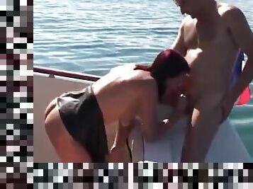 Cute young redhead fucked hard on boat