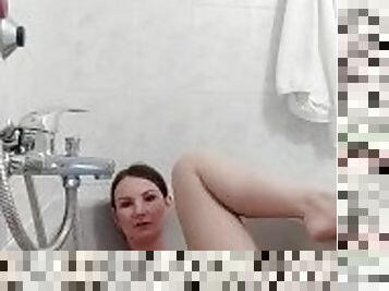 Sexy brunette have a bath and enjoy herself in the water