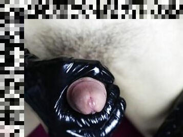 Long and hard massage of the penis with gloves and sweet moans of the stallion