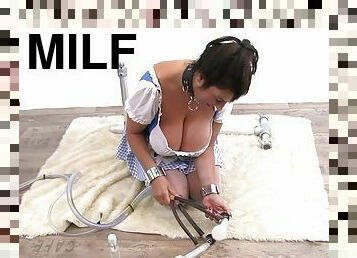 Slutty milf slave in stockings and her milking machine