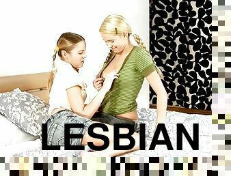 Lesbian teen couple in sex toys session