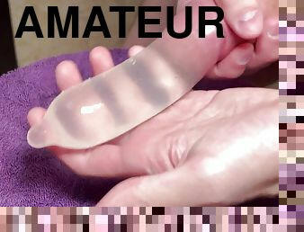CONDOM WITH WATER FILLED WITH CUM