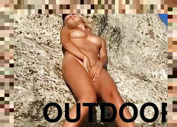 Curly blonde playing in outdoor