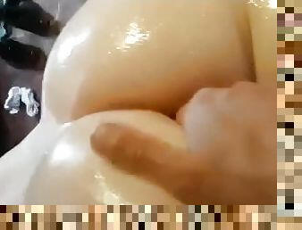 Oiled massage with finger in ass