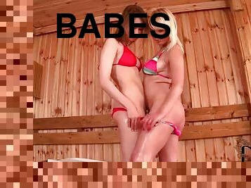 Babes in bikinis lick armpits in sauna