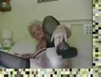 Slender granny spreading her ass