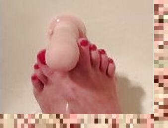 Bright red toes with dildo in shower