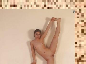 Perfect body teen Irina Galkina stretching her legs on floor naked