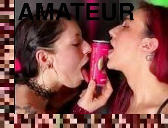 Girls kissing with playing with Liquid X