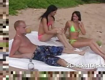 Naked babes get too hot under the torrid beach sun