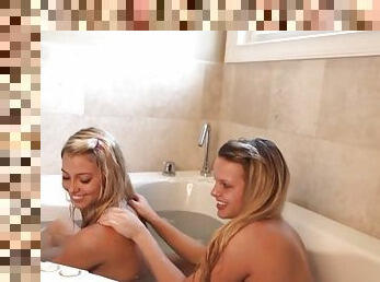 Little Becky and her girlfriend share a bathtub and a big dildo!