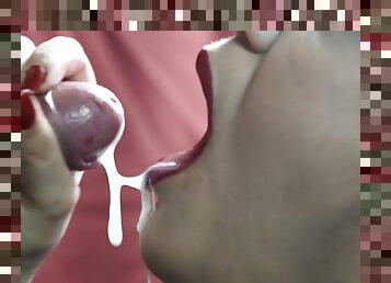 Cumshot on the tongue in close-up