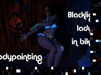 MistressOnline in bikini painting her own body