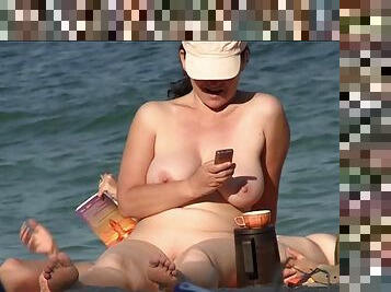 Sexy babes nudist tanning naked on the beach