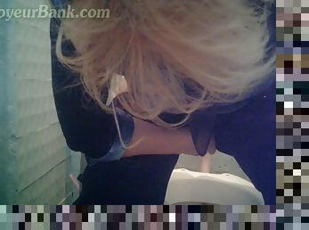 Blonde is pissing on the hidden cam