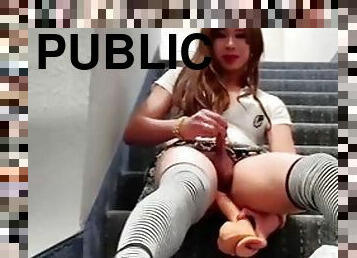 Sissy slut Bess fucks herself on a public staircase