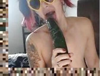 Cute girl fucking cucumber