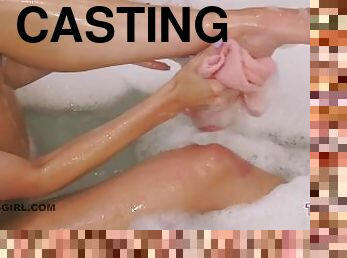 Beautiful blonde masturbates in the bath