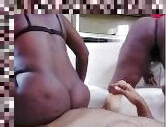 2 chubby African woman taking care of one man during a threesome.