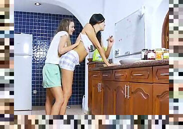 Girls trying oral sex in the kitchen