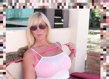 Busty old mommy enjoys her new toy in a very sunny porn video